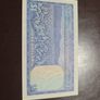 Rhodesia P38 UNC 1 Dollar Note. Image 2