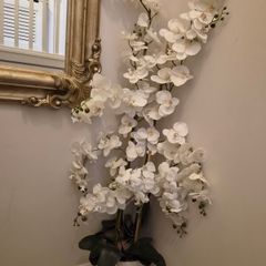 Large faux orchid in marble look pot