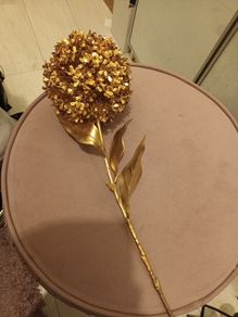 Long stem gold christmas flower