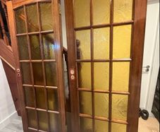 WANTED 2 x teak/mahogany French doors w/ glass panels