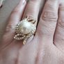 Beautiful gold-plated ring with artificial pearl and crystals. Image 6