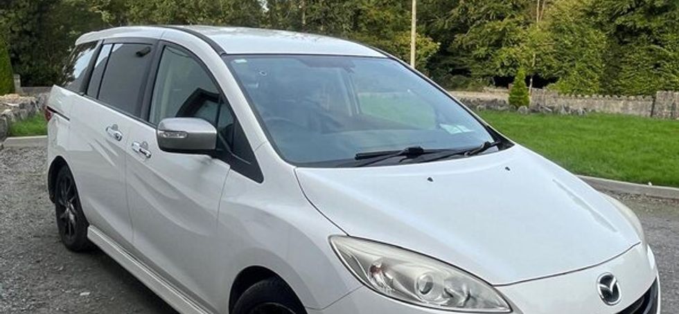 White Mazda 5 sport
