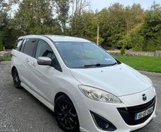White Mazda 5 sport
