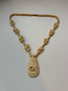Vintage Hand Carved Bovine Bone Bead Necklace Featuring Elephant Pendant