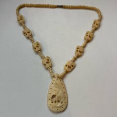 Vintage Hand Carved Bovine Bone Bead Necklace Featuring Elephant Pendant