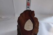 Art Deco Holly Log With White Face Stone.