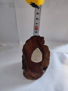 Art Deco Holly Log With White Face Stone.
