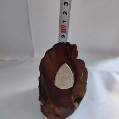 Art Deco Holly Log With White Face Stone.