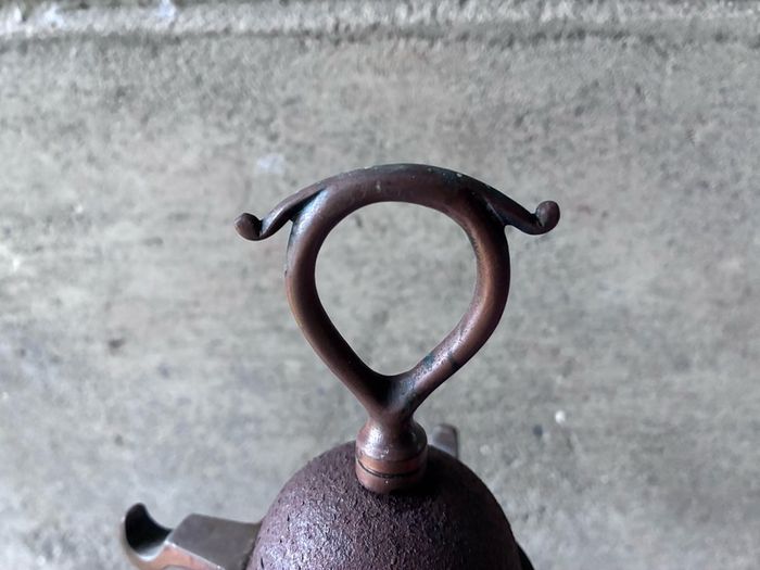 Unusual antique copper companion set holder