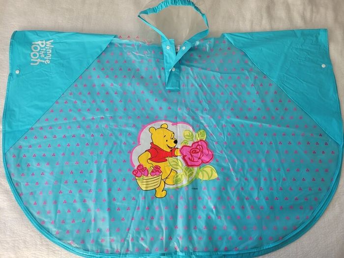 Decathlon Guechua Girls Rain Poncho, size: 4-6 years, plus Free Winnie the Pooh Rain Poncho size 6+