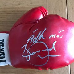 Signed boxing glove and magazine