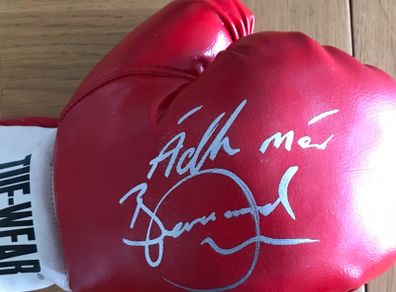 Signed boxing glove and magazine
