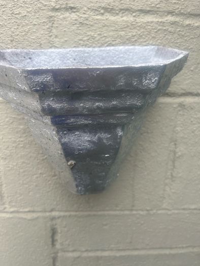 3 water hoppers converted to plant holders. With drainage