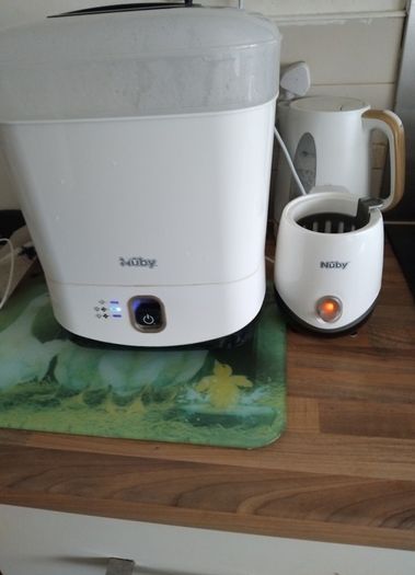 Nuby Sterilizer,bottle warmer,microwave sterliser