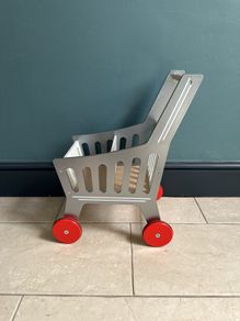 Kids wooden shopping trolley