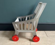 Kids wooden shopping trolley