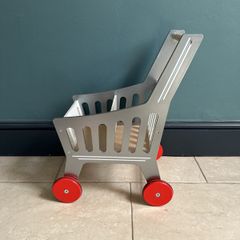 Kids wooden shopping trolley