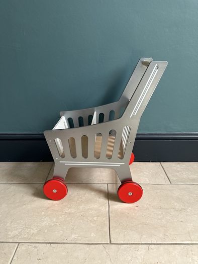 Kids wooden shopping trolley