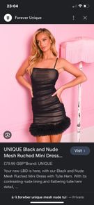 Tags on black mesh dress in black and nude underlay uk14