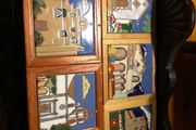 Hand painted tiles of churches