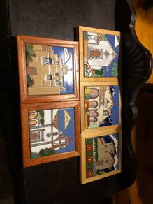 Hand painted tiles of churches
