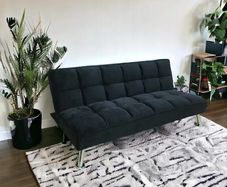 Black folding 3 seater Sofa bed.