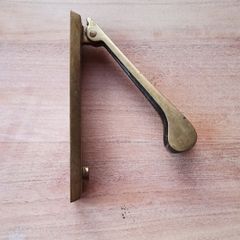Antique brass front door knocker