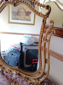 Ornate gold-tone dressing table mirror