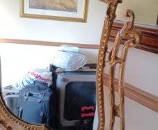 Ornate gold-tone dressing table mirror