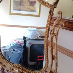 Ornate gold-tone dressing table mirror