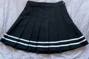 black pleated skirt