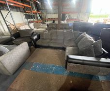 Black/grey corner sofa with matching chair
