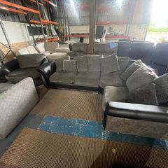 Black/grey corner sofa with matching chair