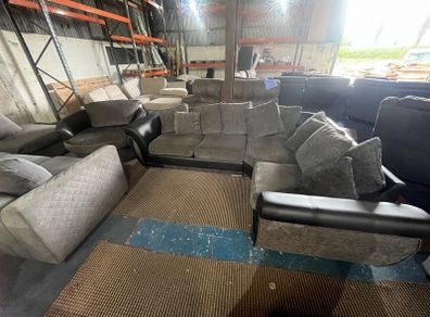 Black/grey corner sofa with matching chair