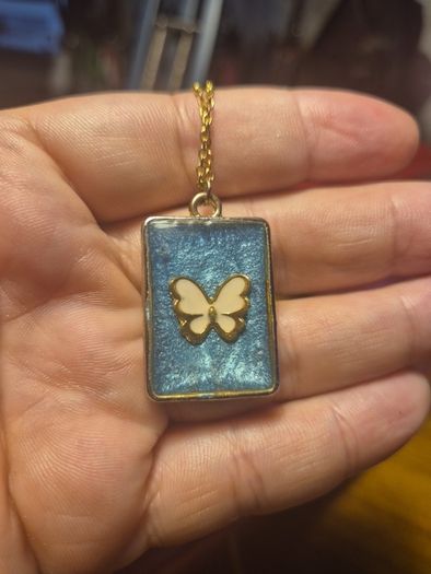 White Butterfly Necklace in Blue Background and Golden Frame