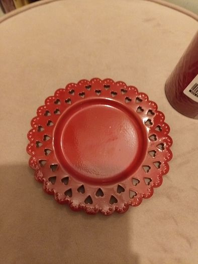 Red candle and plate