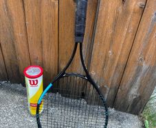 tennis racket and balls