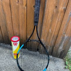 tennis racket and balls