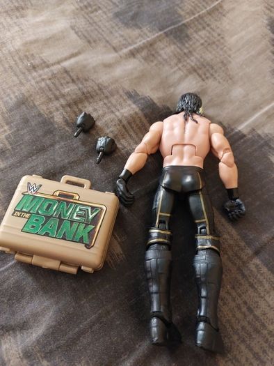 wwe Brand New Seth Rollins Ellite with extras