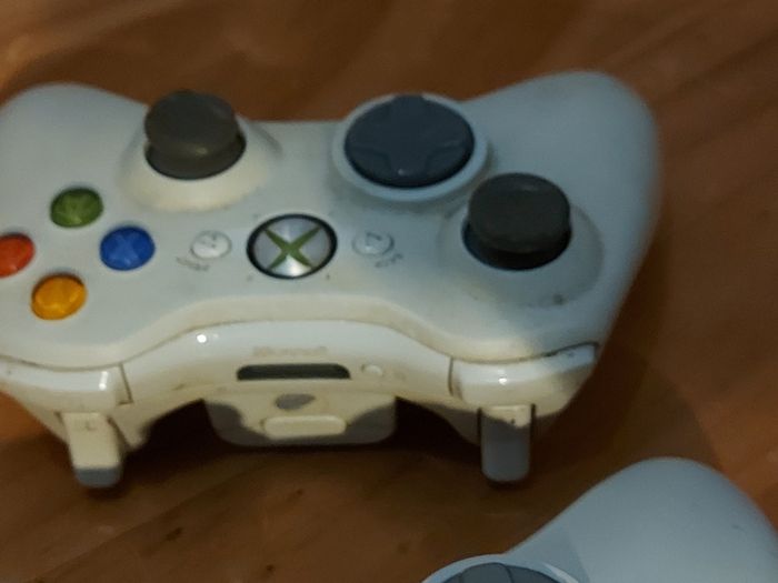 XBOX 360, with Power Charger, 2 Controlllers with Charger, wifi ariel, Communication cable, all in excellent cosmetic condition, not tested