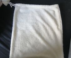 small cream fleece pullstring bag