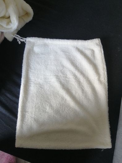 small cream fleece pullstring bag