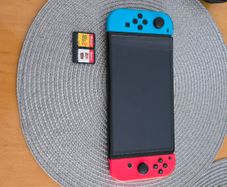 Nintendo Switch OLED + 2 Mario Games + Case & Accessories
