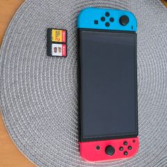 Nintendo Switch OLED + 2 Mario Games + Case & Accessories