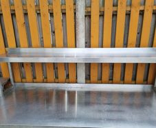 Stainless steel table with upstand