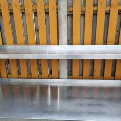 Stainless steel table with upstand