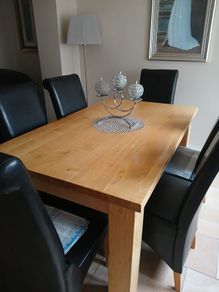 Solid oak table with 6 real leather chairs