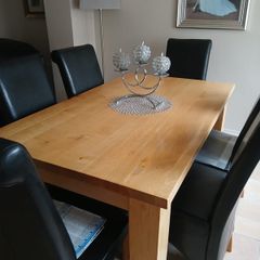 Solid oak table with 6 real leather chairs