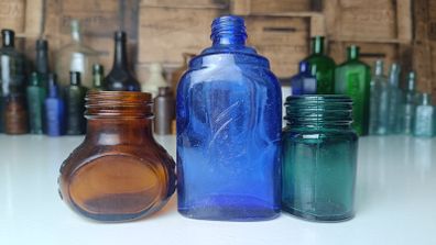 459 - Set of Three Beautiful Vintage Glass Decorative Collectible Bottles - Amber Eire Bovril, Cobalt Blue Magnesia and Turquoise Science Cream