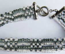 Kumihimo Seed Bead Bracelet: Black, White,  Silver Clasp